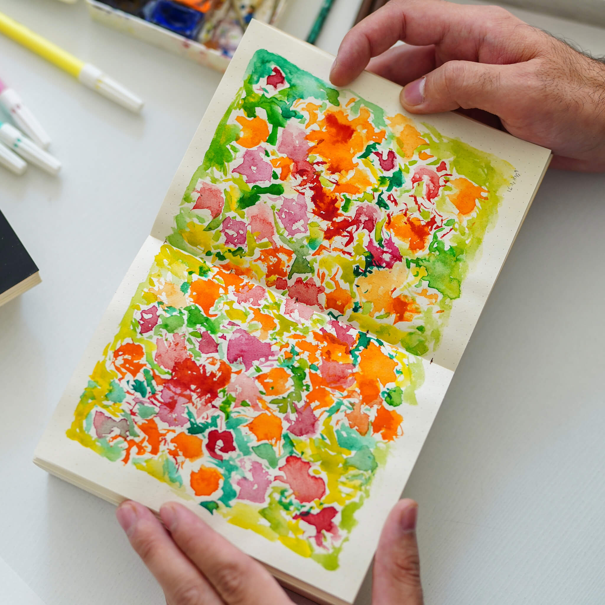 basenotes 1216 Kraft Paperbook open with vibrant watercolour painting across a two-page spread.