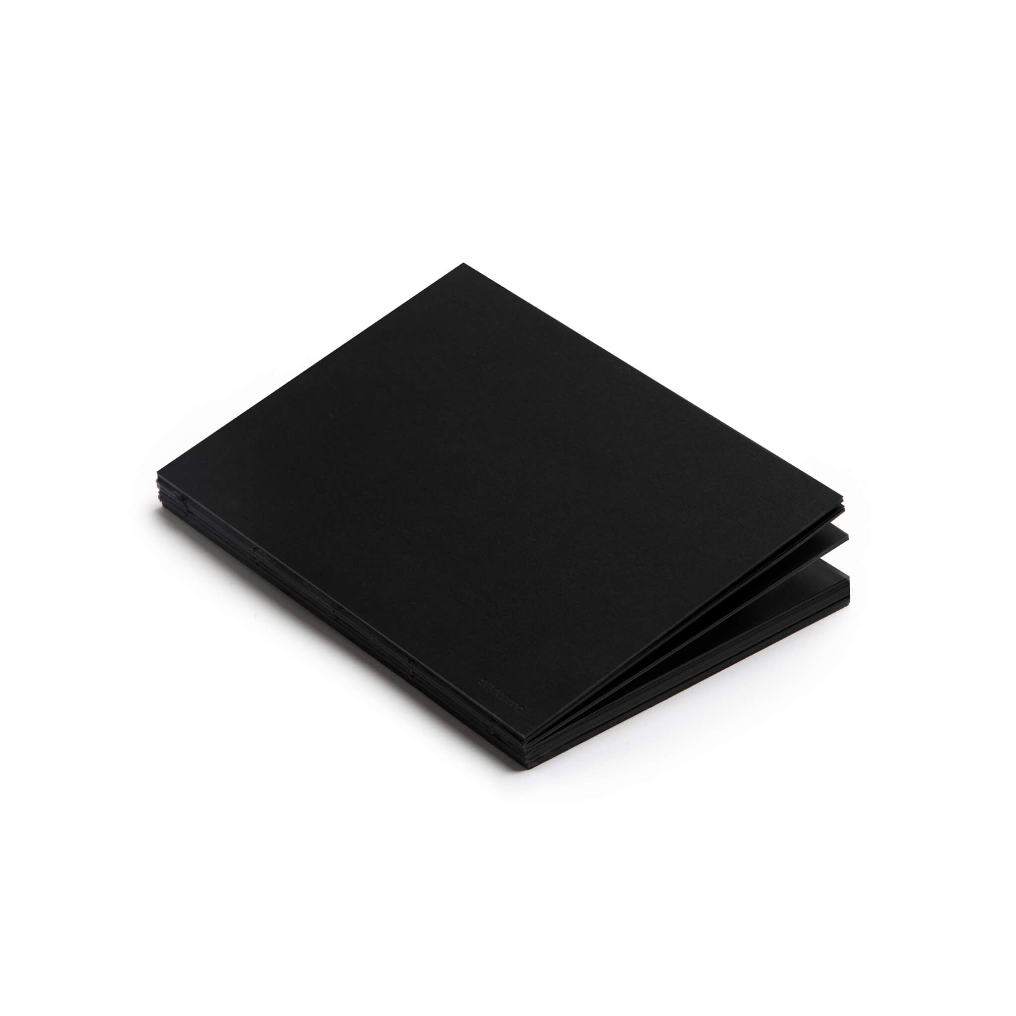 basenotes 1623B Black Paper book showing section dividers and exposed hand-stitched binding.