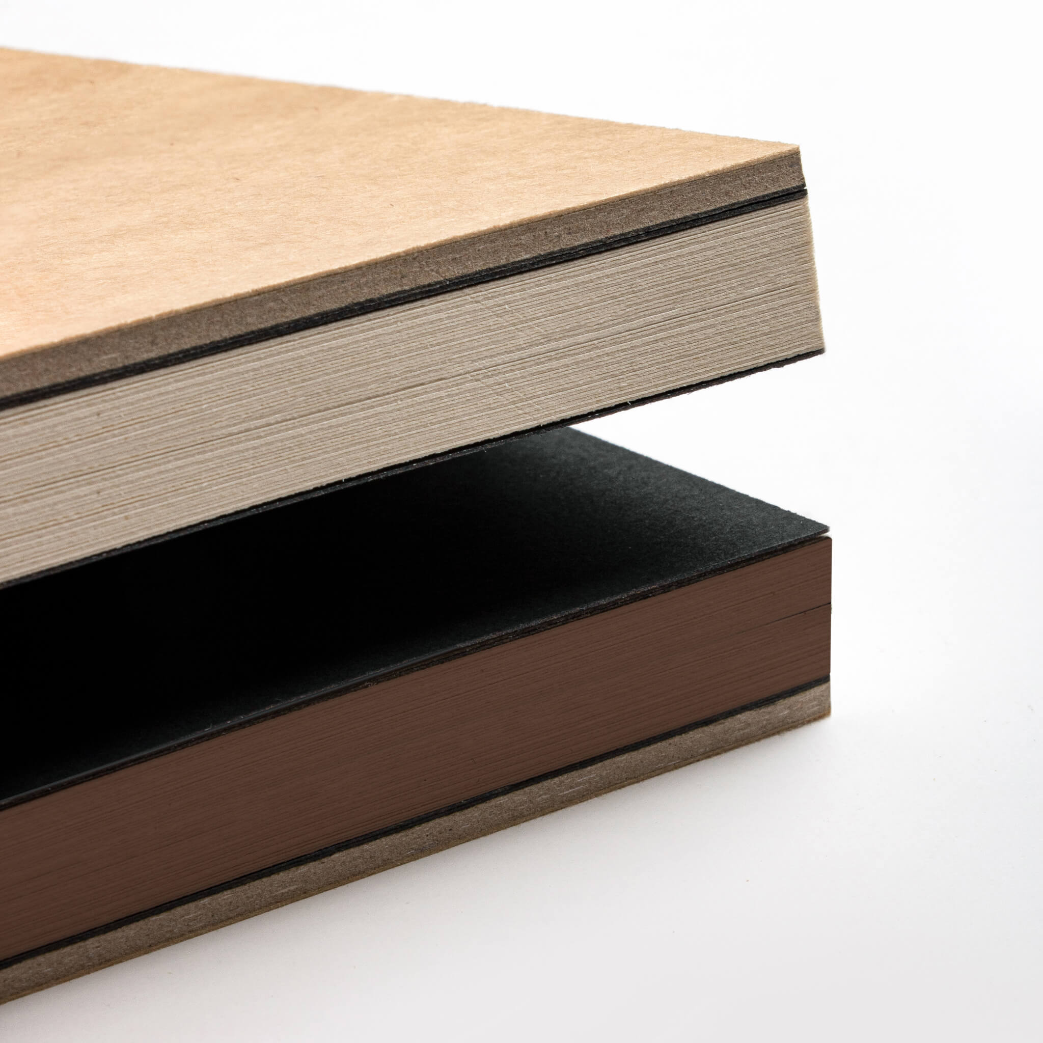 basenotes 2316M Paper books in Kraft and black covers, showing layered edges of Kraft and multimedia paper.