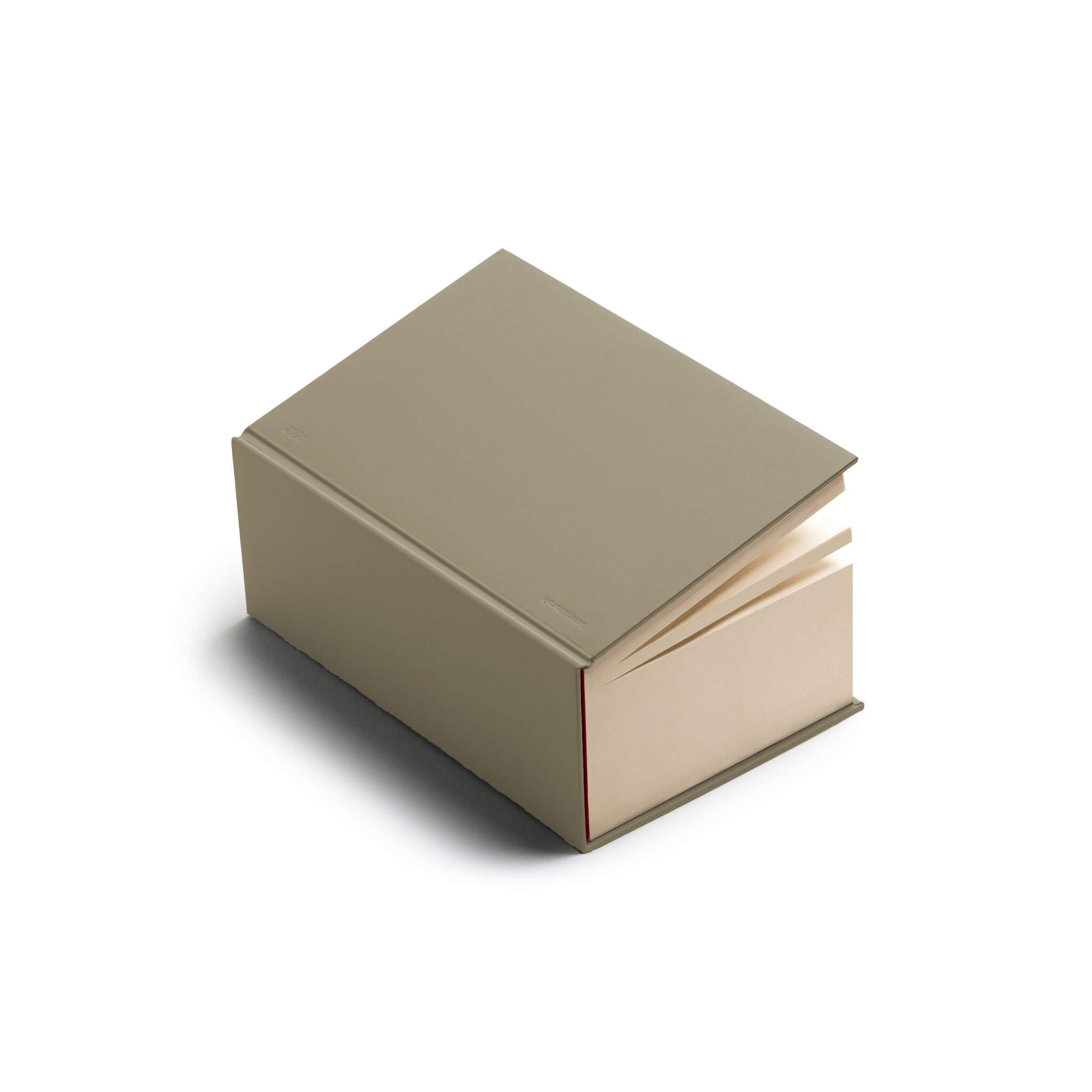 basenotes 0512 notebook in soft beige hardcover, hand-sewn and made with FSC-certified bulky paper. Designed for durability, simplicity, and everyday writing.