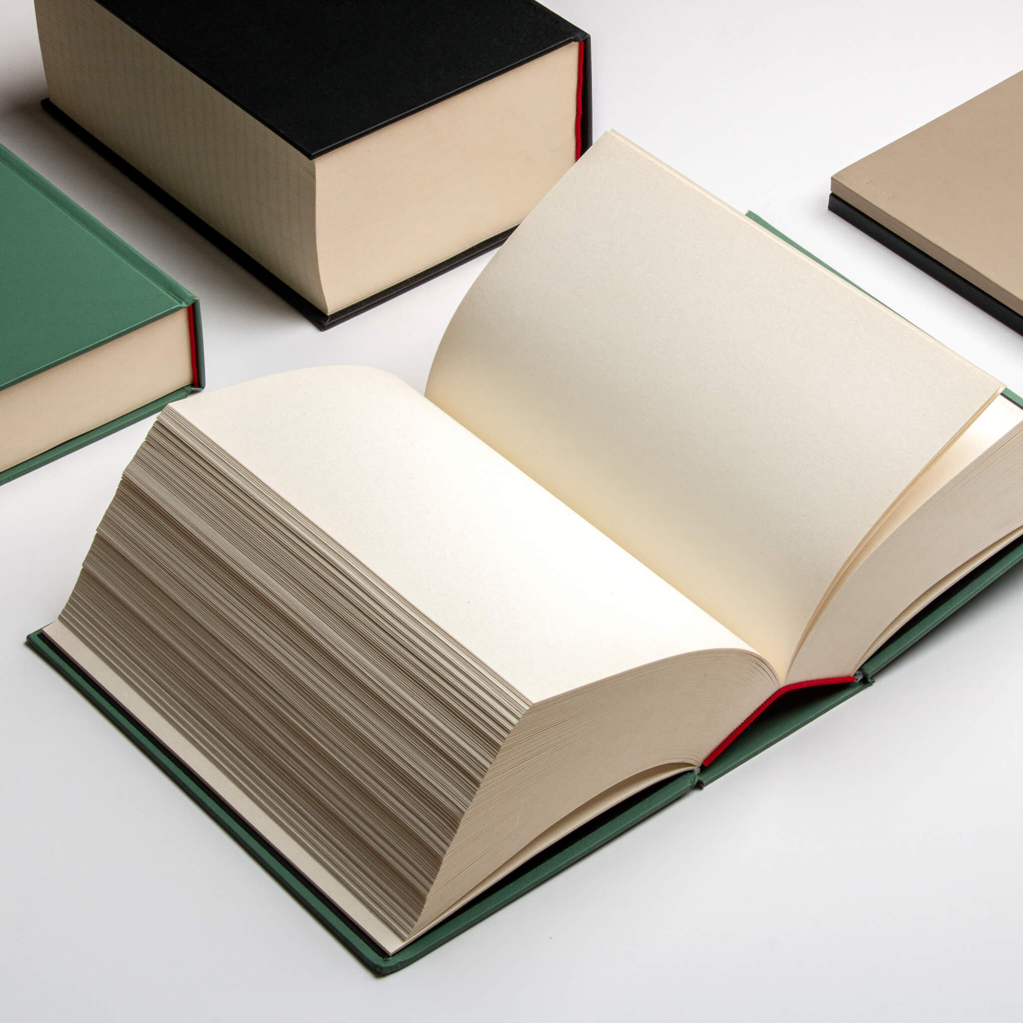 Open basenotes 0512 Notebook in studio lighting, highlighting the lay-flat design and textured cream-coloured bulky pages.