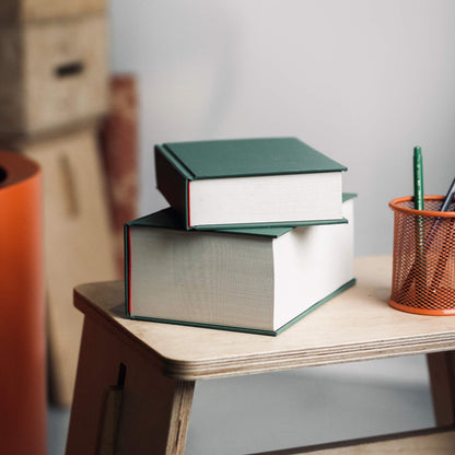 Stacked basenotes 0512 green hardcover notebook featuring 1024 pages of bulky acid-free paper and structured spine.