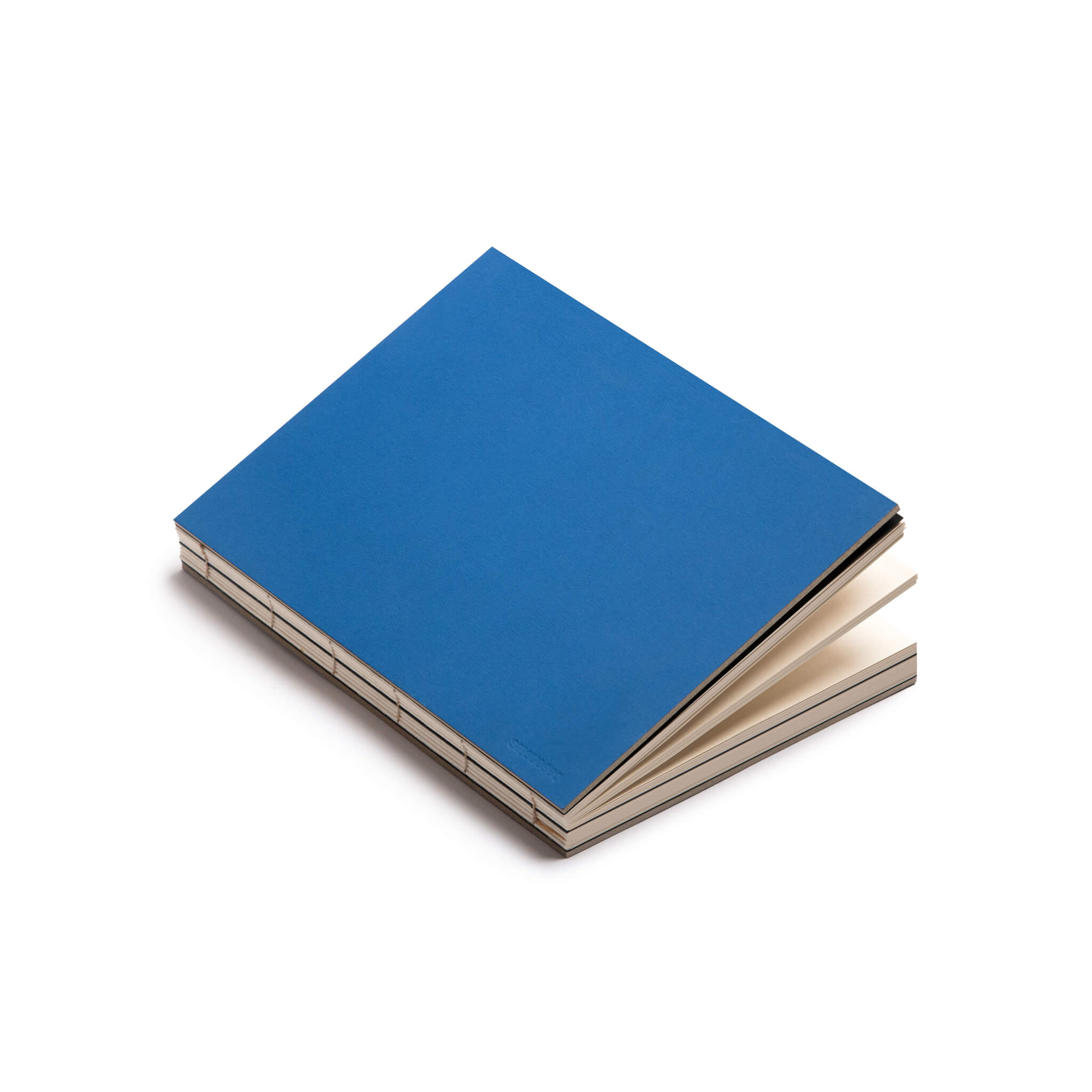 basenotes 1623 Paperbook in Blue, premium artisan notebook with eco-friendly pages and visible stitch binding.