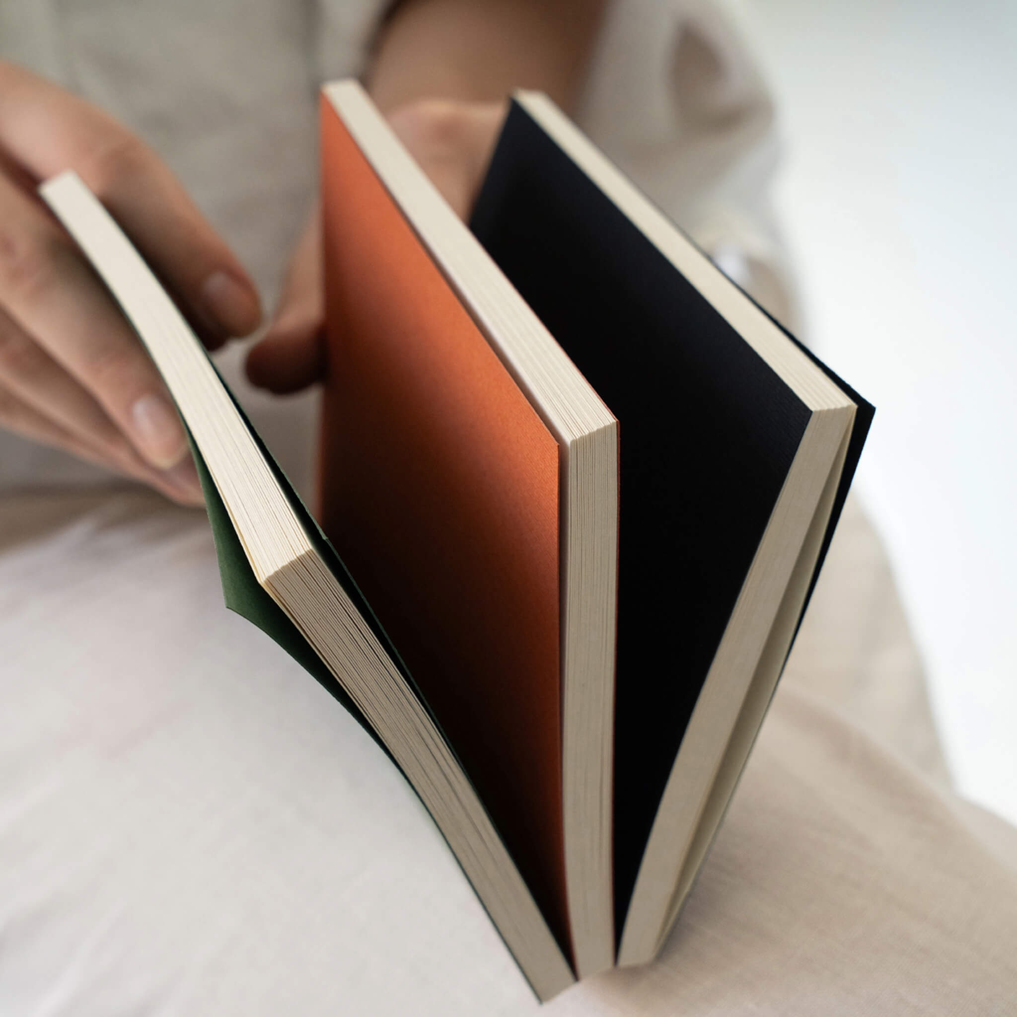 Macro shot of basenotes 0144 Notebook pages with visible grain and fine binding seam for smooth turning and durability.