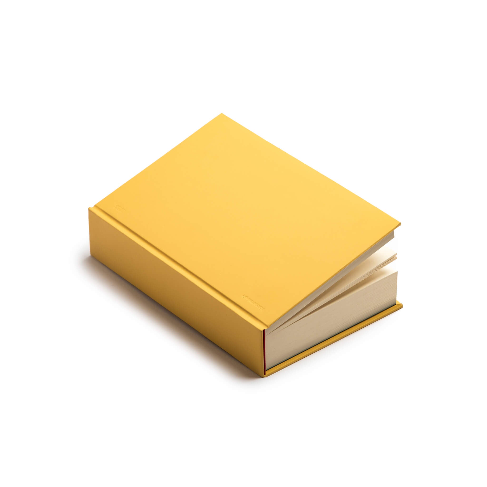 Yellow basenotes 0256 Notebook in a clean flatlay, highlighting its durable hardcover and thick pages.