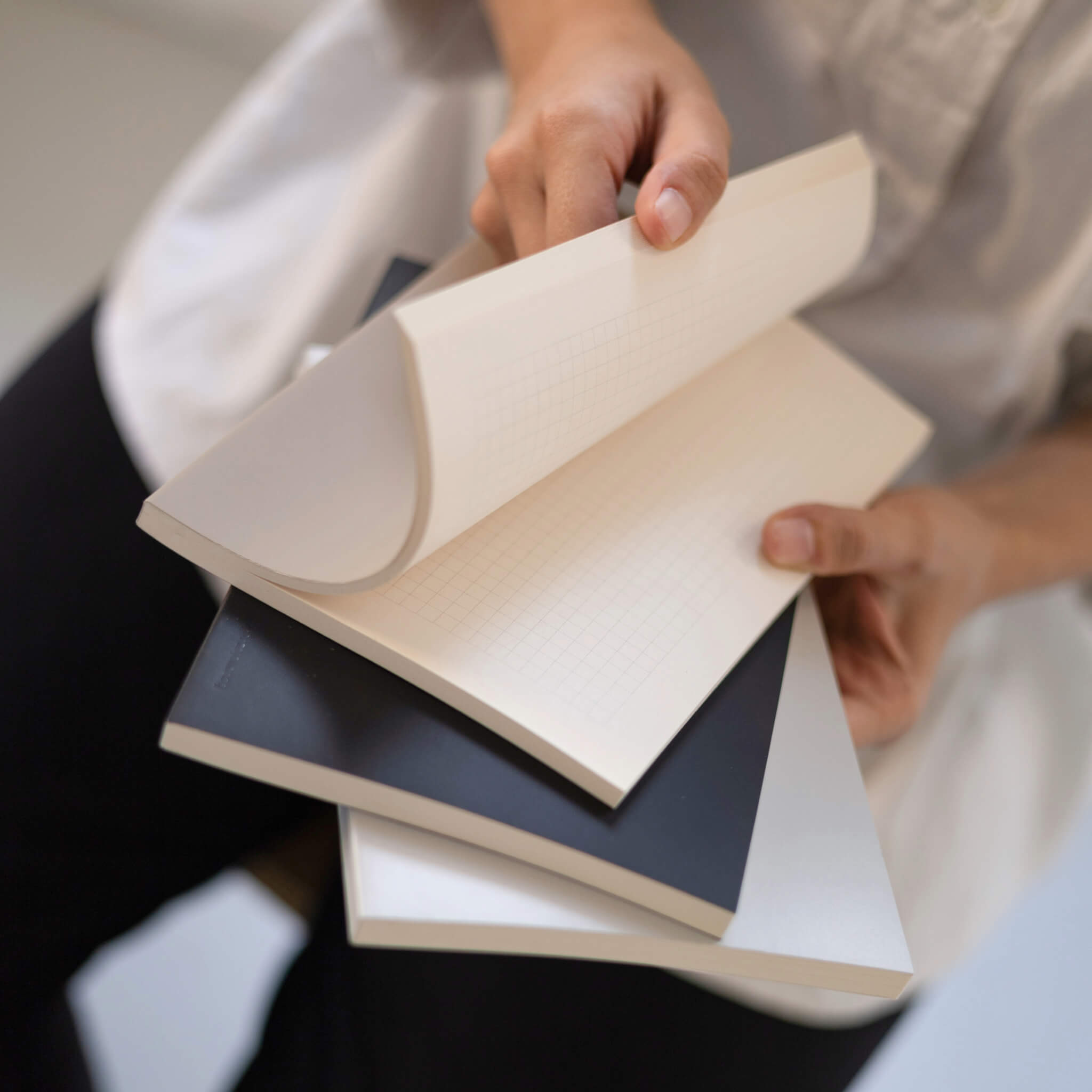 Open basenotes 0480 Notebook showing grid paper pages with soft ivory tone, ideal for notes and sketches.