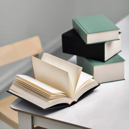 basenotes 0512 1024-page hardcover notebook opened to display thick bulky acid-free paper and lay-flat binding.