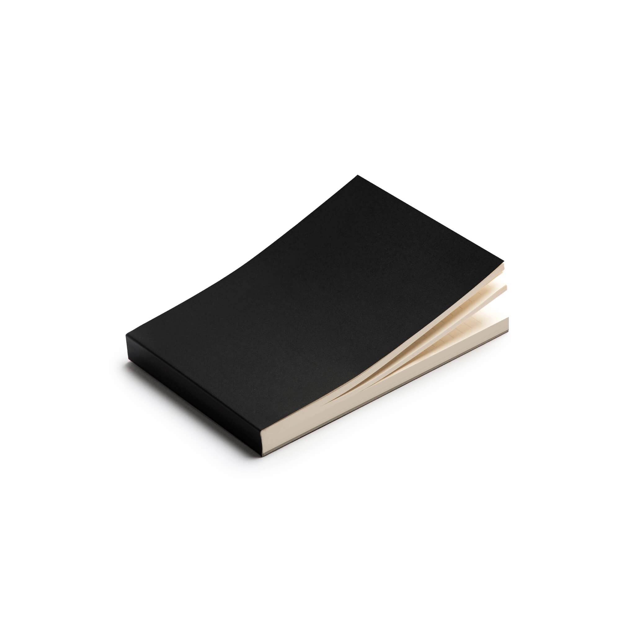basenotes 0960 Notebook with black cover shown slightly open, revealing smooth cream-coloured pages.