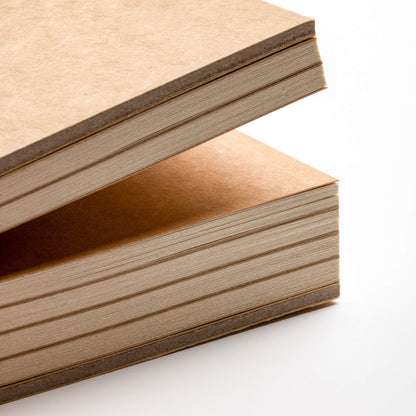 Side view of basenotes 1111 Paperbook stacked showing handmade cover and 127 GSM acid-free pages