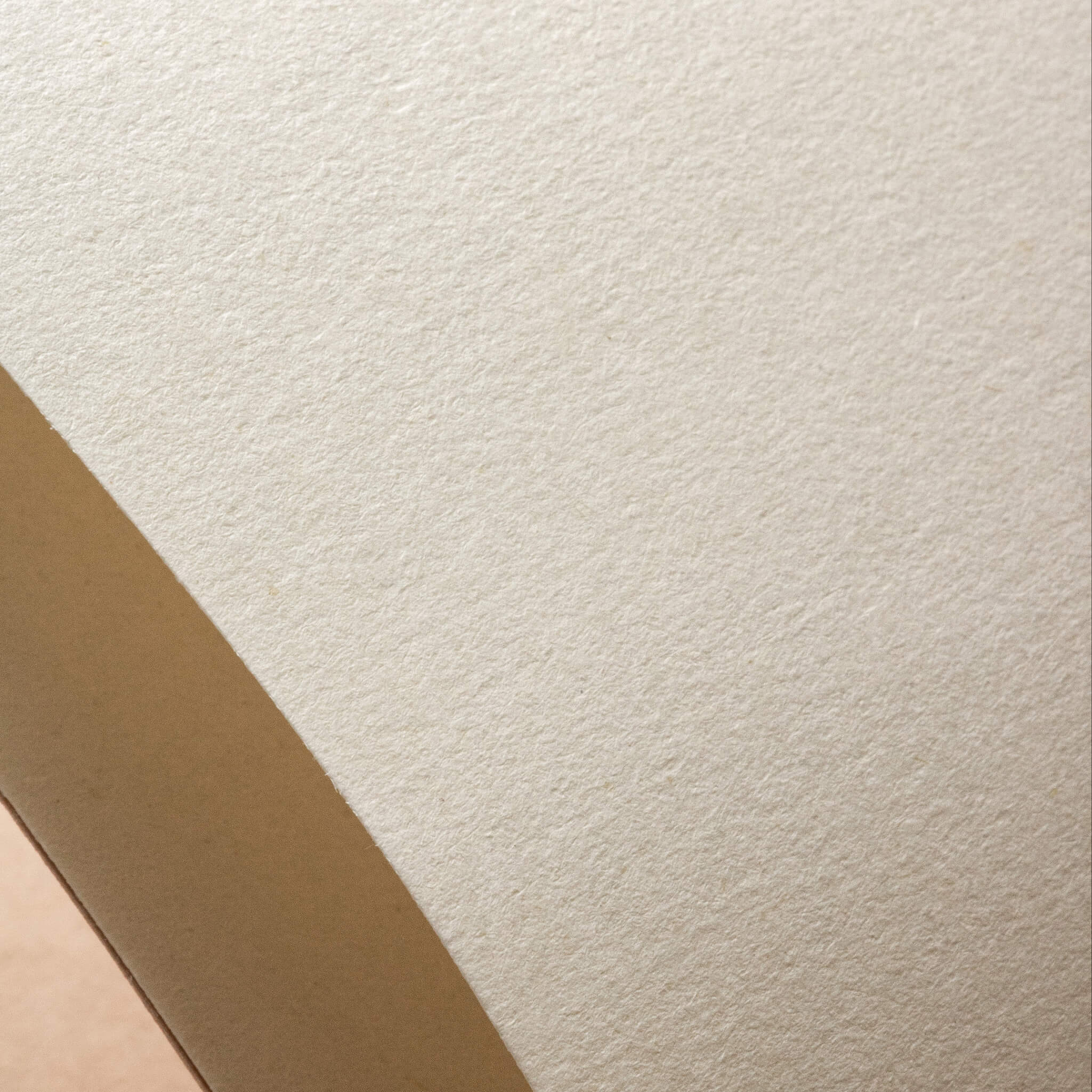 Close-up of smooth cream paper inside basenotes 1216 Paperbook