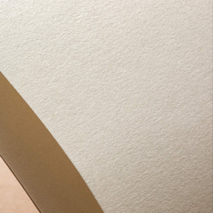 Close-up of smooth cream paper inside basenotes 1216 Paperbook