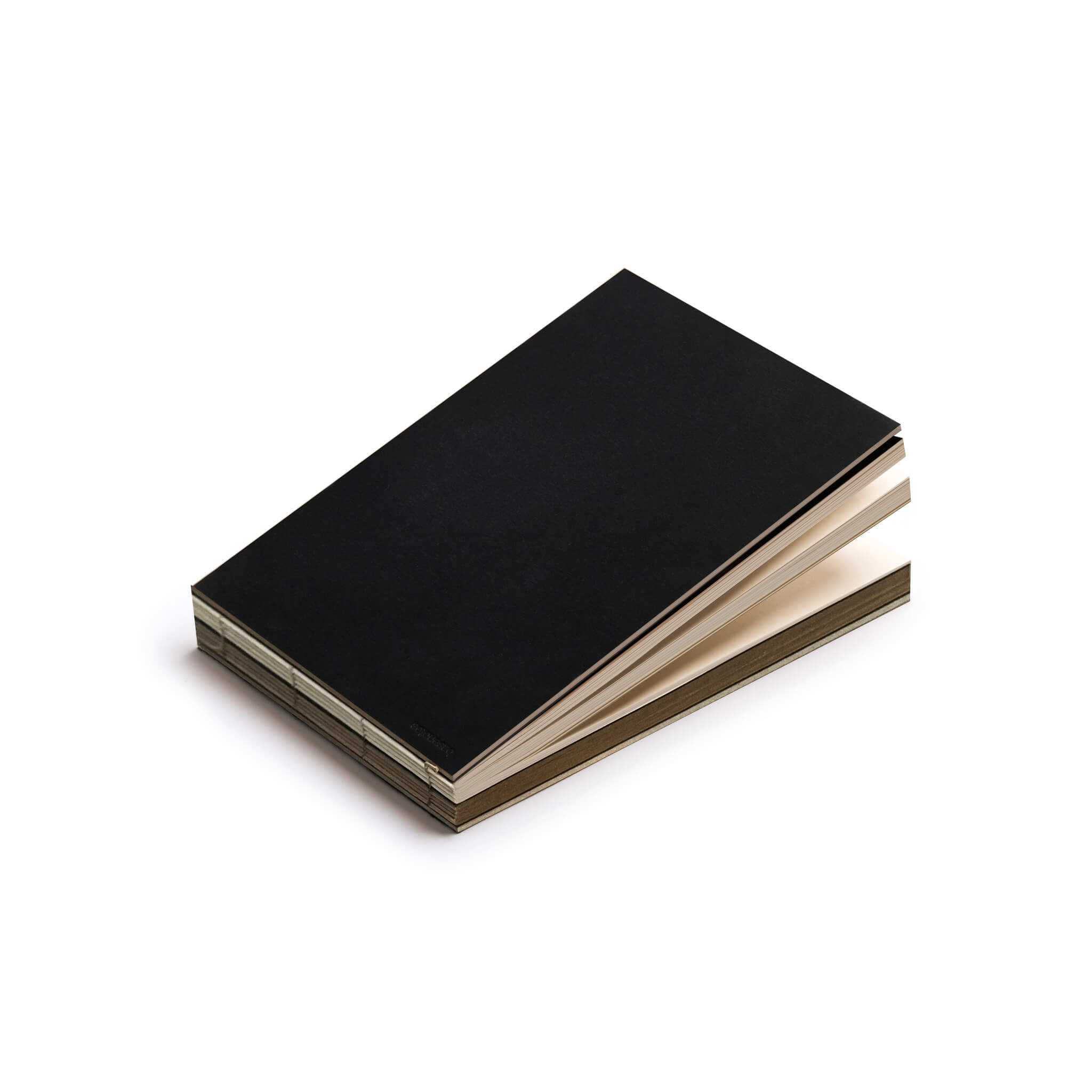 basenotes 2316M Paper book in black cover, landscape format, with visible section divisions and exposed spine.