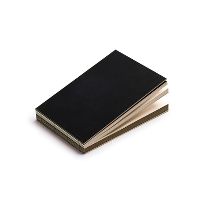 basenotes 2316M Paper book in black cover, landscape format, with visible section divisions and exposed spine.