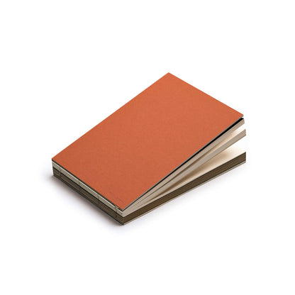 basenotes 2316M Clay Ruse Paper book in landscape format, showing visible hand-stitched binding.