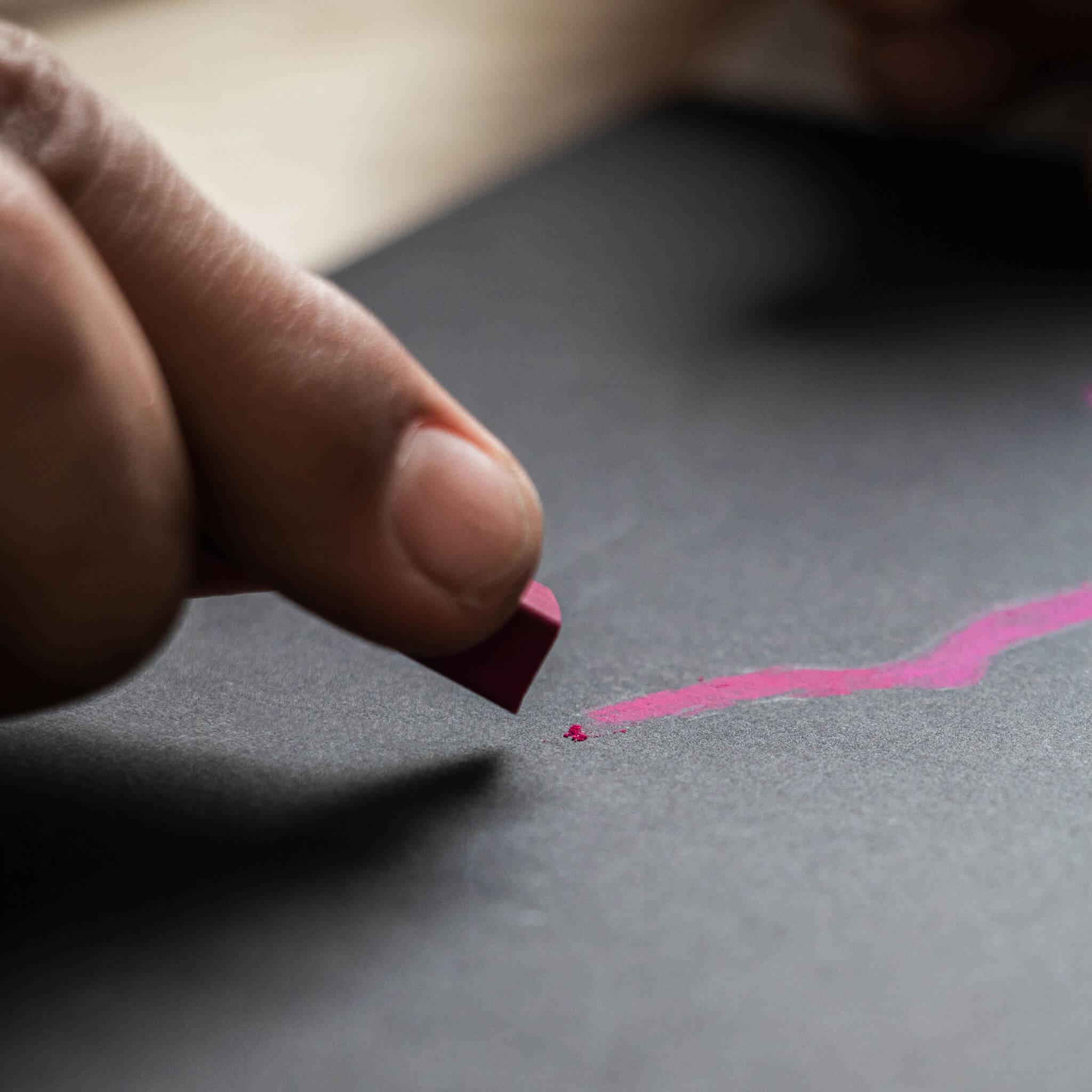 Close-up of pastel drawing on the black paper of the basenotes 2222 Paper book.