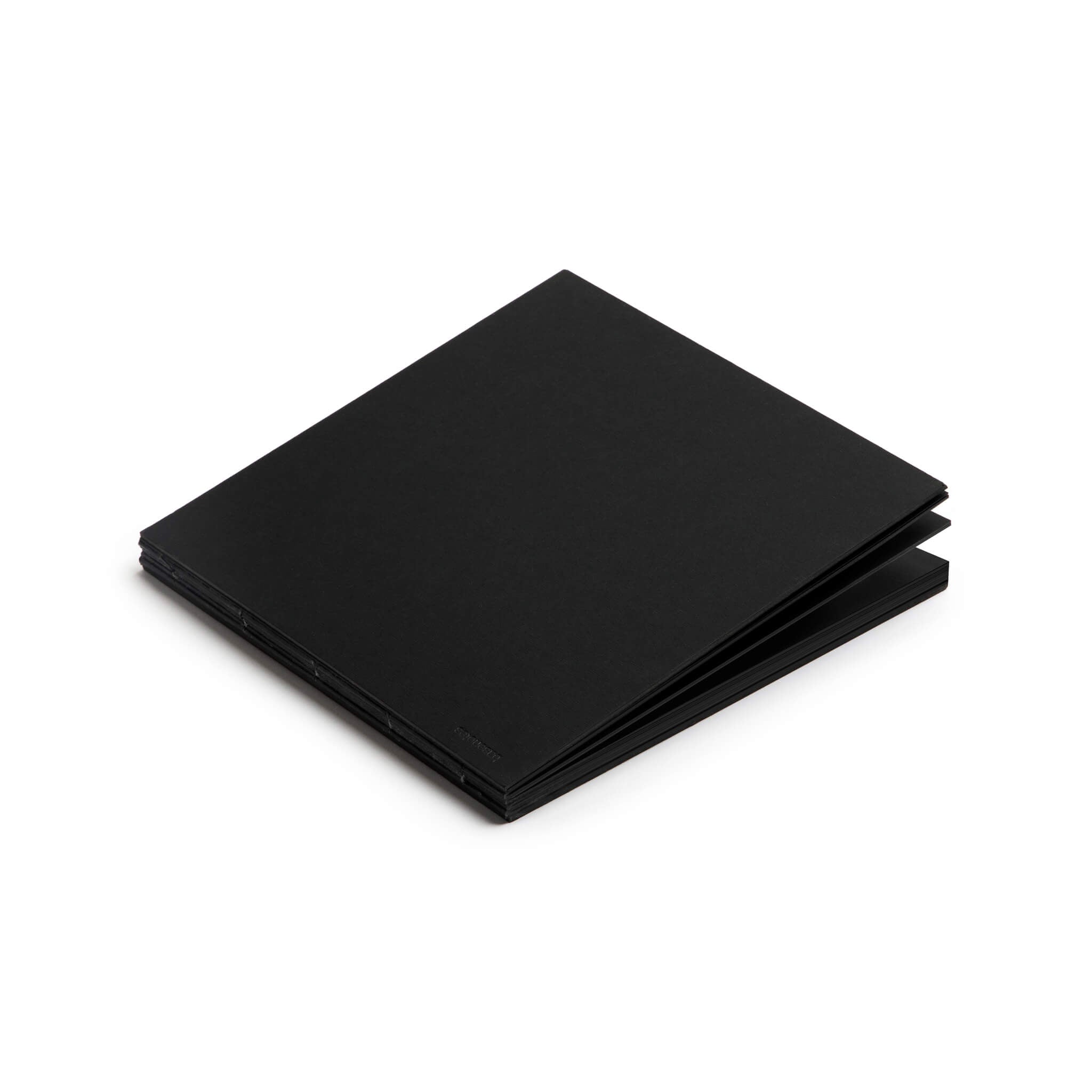 Closed basenotes 2222 Paperbook in black, showing its clean minimalist cover and hand-stitched edge.