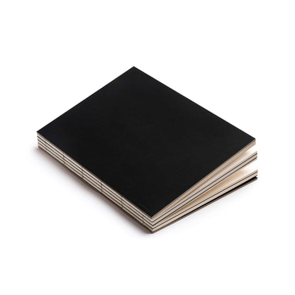 Basenotes 2333 Black Paperbook with minimalist matte black cover and visible stitch binding.