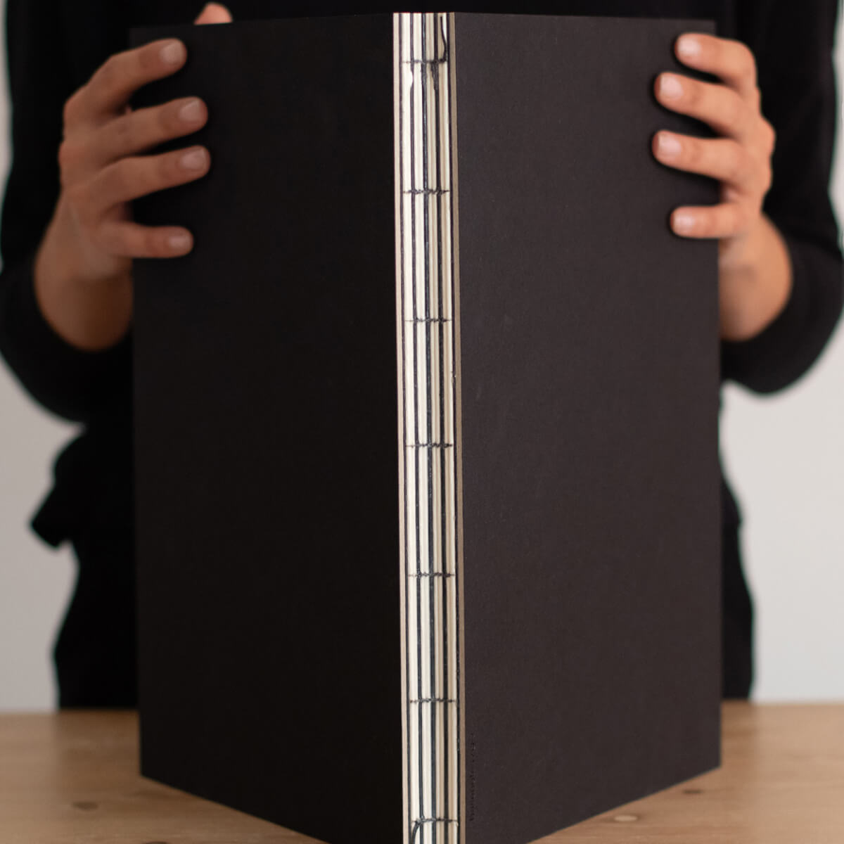 basenotes 2333 Black Paperbook with tracing paper, hand-stitched binding and FSC-certified acid-free pages for creative work.