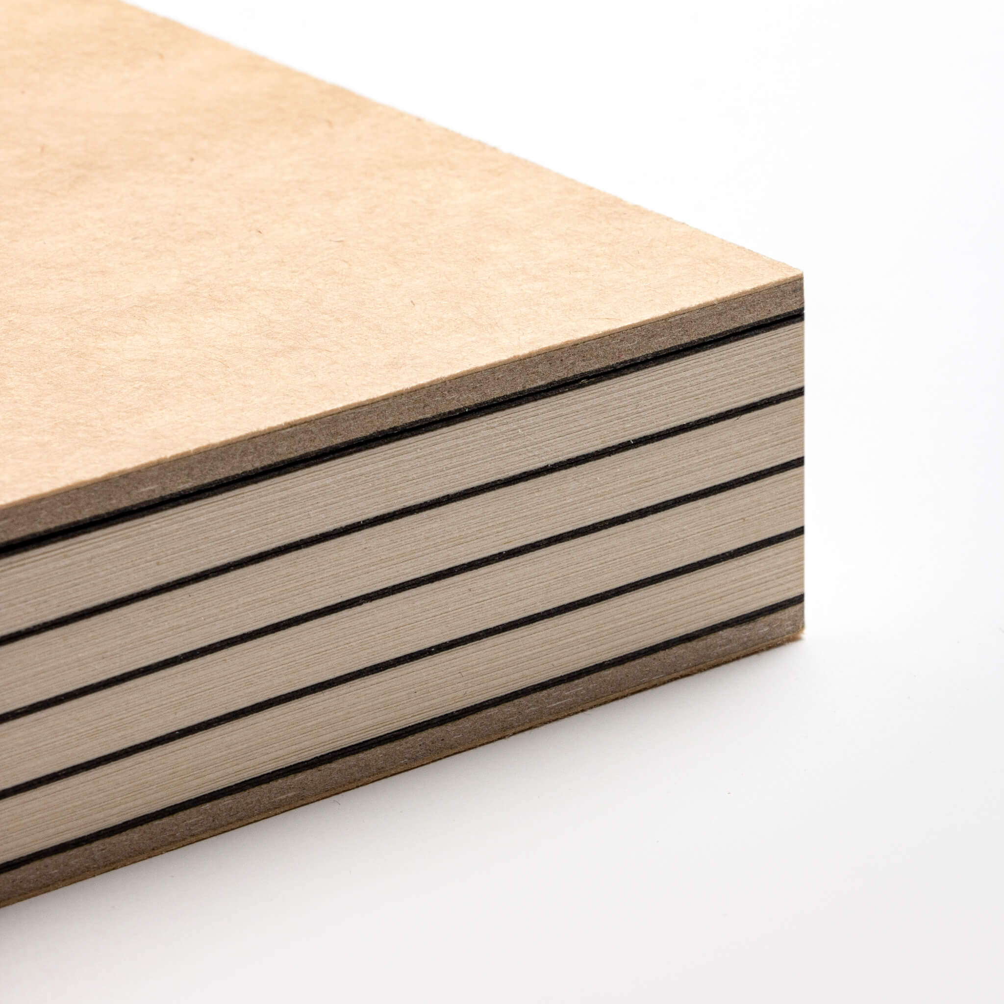 basenotes 2333 Paperbook with kraft cover showing exposed spine and alternating black dividers, crafted with precision binding.