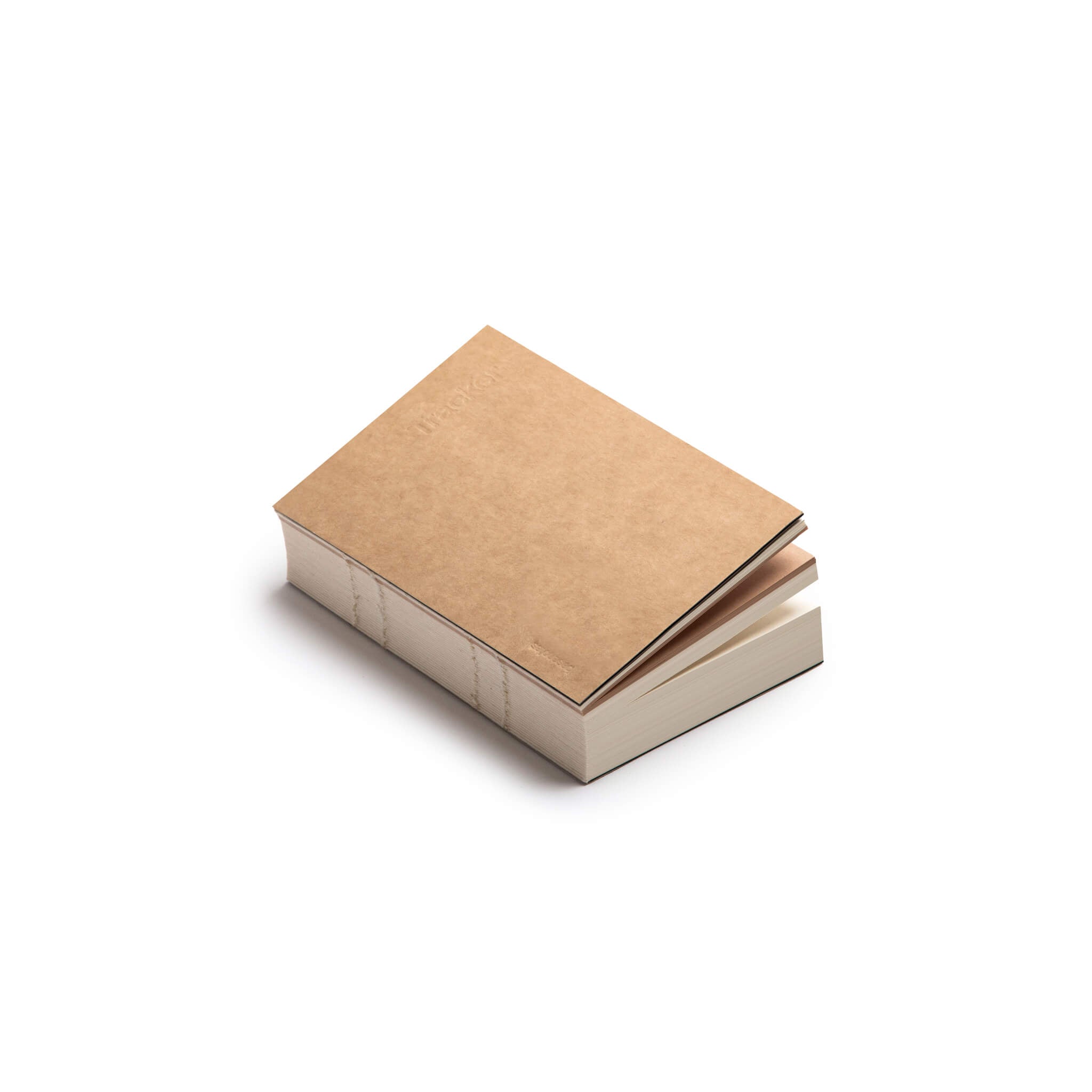basenotes Tracker Notebook with kraft cover, embossed title, and exposed spine stitching.