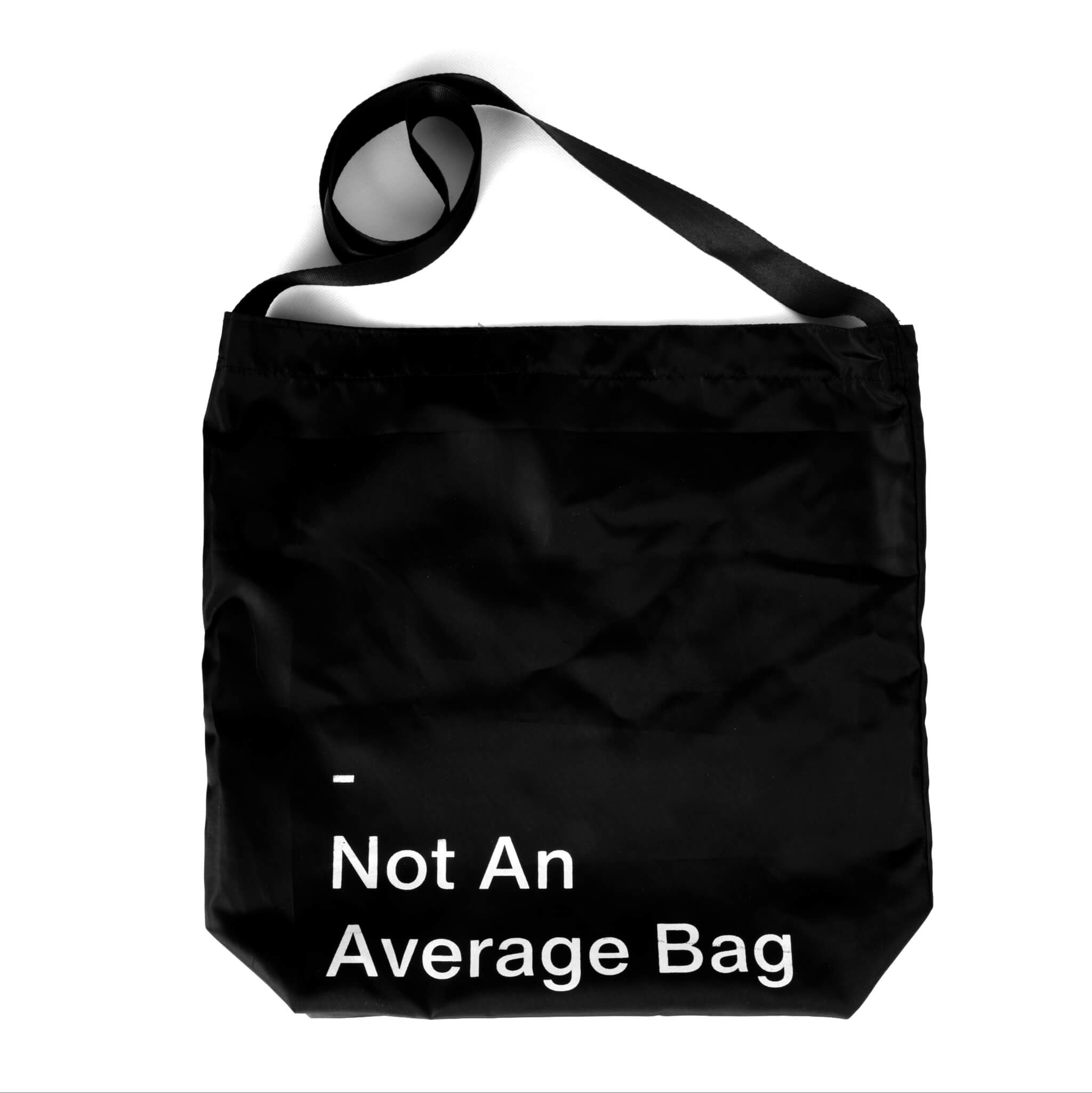 basenotes waterproof utility tote in black, clean product shot on white background