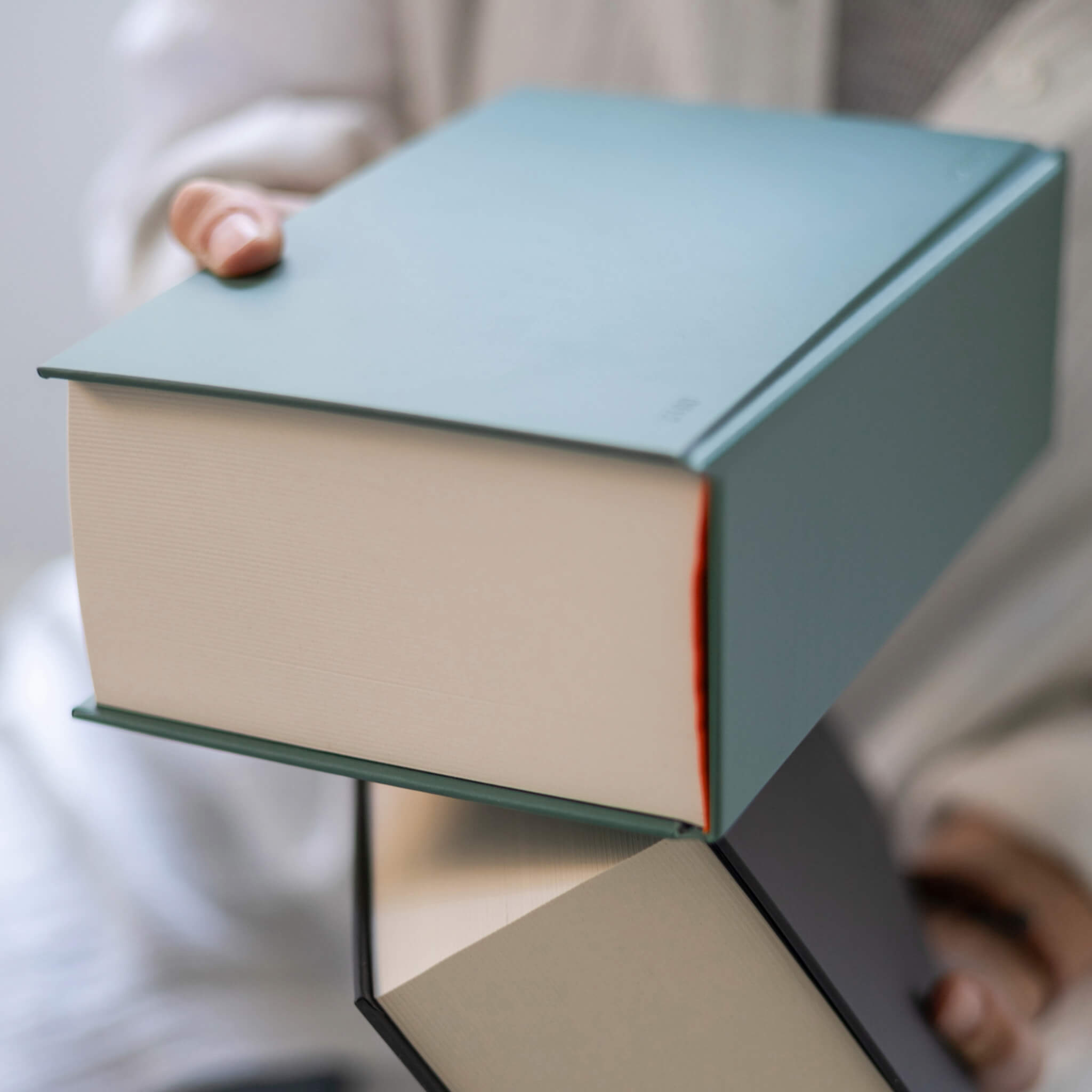 Detail shot of the green basenotes 0512 Notebook showing the smooth waterproof cover and thick FSC-certified writing paper block.