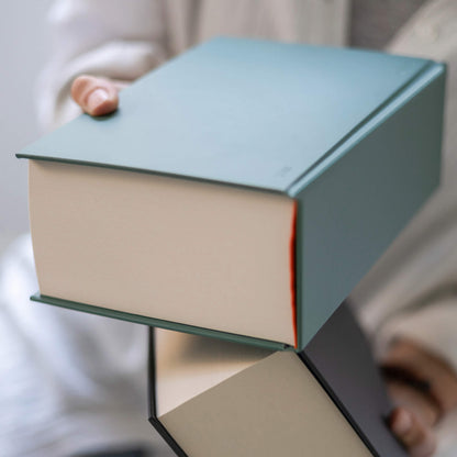 Detail shot of the green basenotes 0512 Notebook showing the smooth waterproof cover and thick FSC-certified writing paper block.