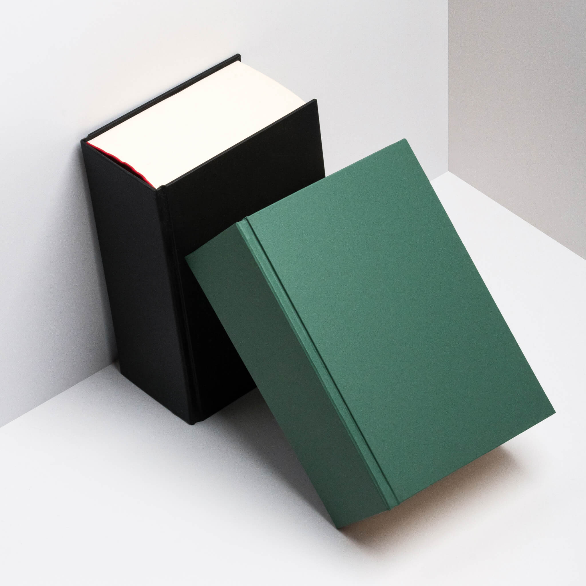 Green and black basenotes 0512 Notebooks displayed together, showing the sturdy hardcover and thick archival-quality paper block.