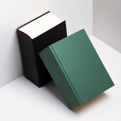 Green and black basenotes 0512 Notebooks displayed together, showing the sturdy hardcover and thick archival-quality paper block.
